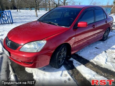 Червоний Міцубісі Lancer, об'ємом двигуна 1.6 л та пробігом 229 тис. км за 5500 $, фото 1 на Automoto.ua