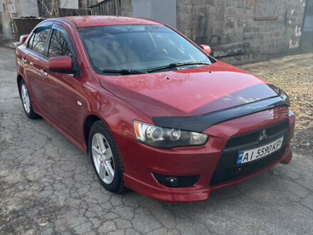 Міцубісі Lancer 2007 у Фастове на Automoto.ua Червоний Міцубісі Lancer, об'ємом двигуна 2 л та пробігом 302 тис. км за 6500 $, фото 1 на Automoto.ua