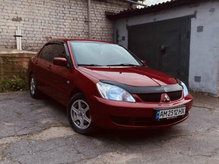 Червоний Міцубісі Lancer, об'ємом двигуна 1.58 л та пробігом 151 тис. км за 5600 $, фото 1 на Automoto.ua