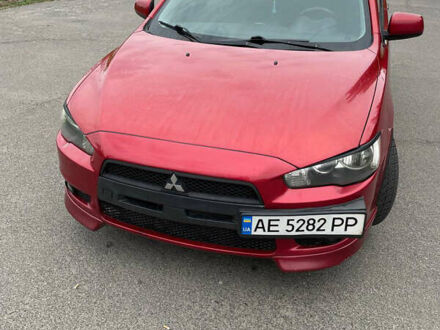 Червоний Міцубісі Lancer, об'ємом двигуна 2 л та пробігом 175 тис. км за 7000 $, фото 1 на Automoto.ua