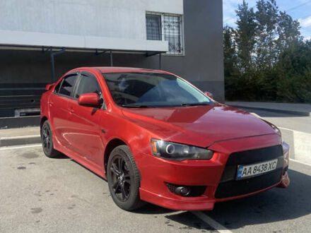 Червоний Міцубісі Lancer, об'ємом двигуна 2 л та пробігом 251 тис. км за 5900 $, фото 1 на Automoto.ua