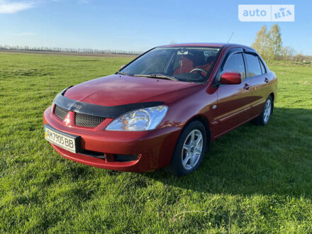 Червоний Міцубісі Lancer, об'ємом двигуна 1.6 л та пробігом 130 тис. км за 5800 $, фото 1 на Automoto.ua