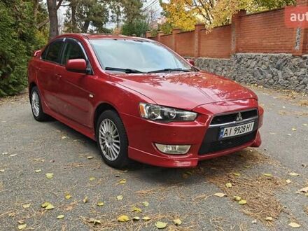 Мицубиси Лансер 2007 в Киеве на Automoto.ua Красный Мицубиси Лансер, объемом двигателя 2 л и пробегом 186 тыс. км за 5600 $, фото 1 на Automoto.ua