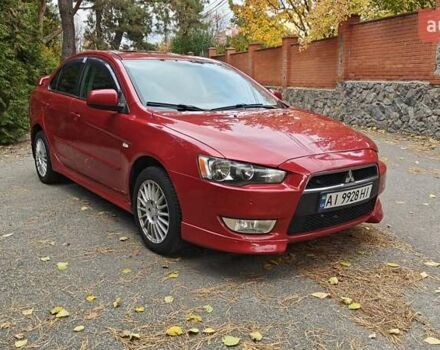 Червоний Міцубісі Lancer, об'ємом двигуна 2 л та пробігом 186 тис. км за 5600 $, фото 1 на Automoto.ua