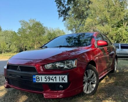 Червоний Міцубісі Lancer, об'ємом двигуна 2 л та пробігом 185 тис. км за 6700 $, фото 1 на Automoto.ua