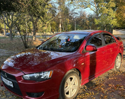 Червоний Міцубісі Lancer, об'ємом двигуна 2 л та пробігом 196 тис. км за 6300 $, фото 1 на Automoto.ua
