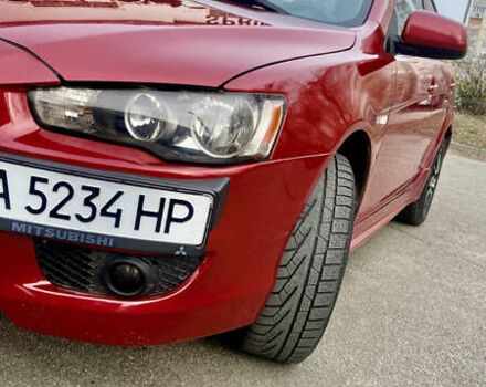 Красный Мицубиси Лансер, объемом двигателя 1.5 л и пробегом 160 тыс. км за 6000 $, фото 1 на Automoto.ua