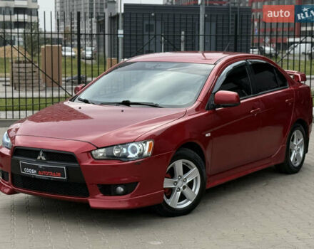 Червоний Міцубісі Lancer, об'ємом двигуна 2 л та пробігом 308 тис. км за 6499 $, фото 1 на Automoto.ua