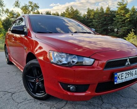 Червоний Міцубісі Lancer, об'ємом двигуна 2 л та пробігом 187 тис. км за 6499 $, фото 1 на Automoto.ua