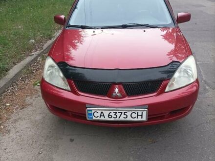 Червоний Міцубісі Lancer, об'ємом двигуна 1.6 л та пробігом 199 тис. км за 5800 $, фото 1 на Automoto.ua