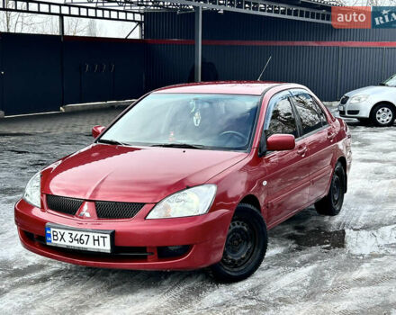 Красный Мицубиси Лансер, объемом двигателя 1.6 л и пробегом 312 тыс. км за 3400 $, фото 1 на Automoto.ua