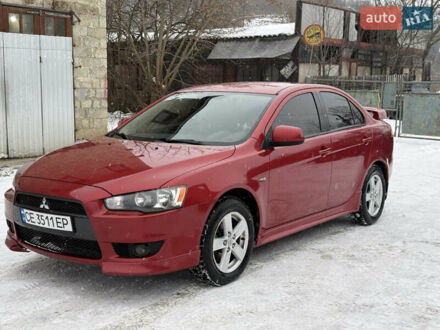 Червоний Міцубісі Lancer, об'ємом двигуна 2 л та пробігом 220 тис. км за 6260 $, фото 1 на Automoto.ua