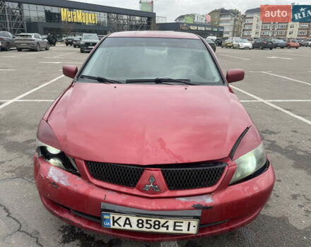 Червоний Міцубісі Lancer, об'ємом двигуна 1.58 л та пробігом 290 тис. км за 2650 $, фото 1 на Automoto.ua