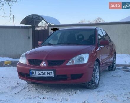 Червоний Міцубісі Lancer, об'ємом двигуна 1.58 л та пробігом 220 тис. км за 3650 $, фото 1 на Automoto.ua