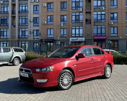 Червоний Міцубісі Lancer, об'ємом двигуна 2 л та пробігом 187 тис. км за 6200 $, фото 1 на Automoto.ua