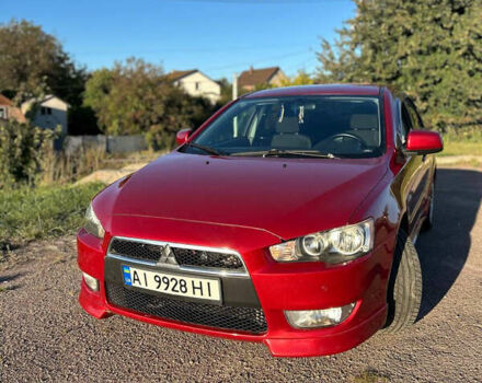 Червоний Міцубісі Lancer, об'ємом двигуна 2 л та пробігом 186 тис. км за 5800 $, фото 1 на Automoto.ua