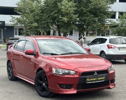 Червоний Міцубісі Lancer, об'ємом двигуна 2 л та пробігом 184 тис. км за 5999 $, фото 1 на Automoto.ua