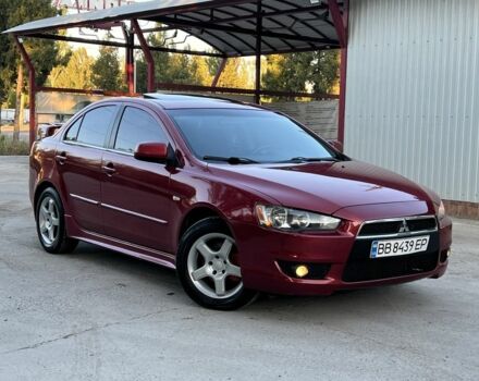 Червоний Міцубісі Lancer, об'ємом двигуна 2 л та пробігом 259 тис. км за 6500 $, фото 1 на Automoto.ua