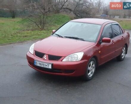 Красный Мицубиси Лансер, объемом двигателя 1.6 л и пробегом 250 тыс. км за 3700 $, фото 1 на Automoto.ua