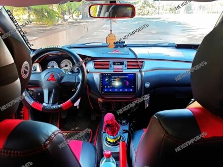 Красный Мицубиси Лансер, объемом двигателя 0 л и пробегом 252 тыс. км за 5400 $, фото 1 на Automoto.ua