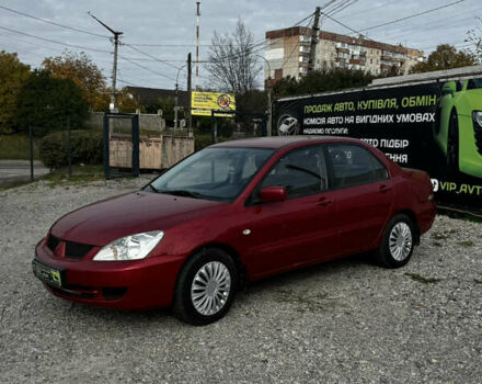 Червоний Міцубісі Lancer, об'ємом двигуна 1.58 л та пробігом 385 тис. км за 4600 $, фото 1 на Automoto.ua