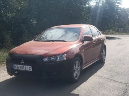 Мицубиси Лансер 2008 в Малине на Automoto.ua Красный Мицубиси Лансер, объемом двигателя 2 л и пробегом 300 тыс. км за 2300 $, фото 1 на Automoto.ua