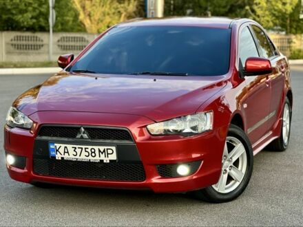 Мицубиси Лансер 2008 в Павлограде на Automoto.ua Красный Мицубиси Лансер, объемом двигателя 2 л и пробегом 190 тыс. км за 6950 $, фото 1 на Automoto.ua
