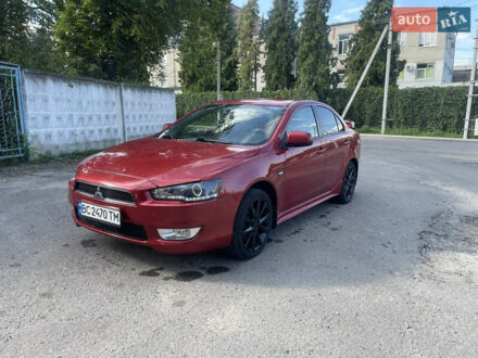 Червоний Міцубісі Lancer, об'ємом двигуна 2 л та пробігом 179 тис. км за 6499 $, фото 1 на Automoto.ua