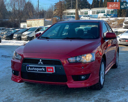 Красный Мицубиси Лансер, объемом двигателя 2 л и пробегом 119 тыс. км за 7990 $, фото 1 на Automoto.ua