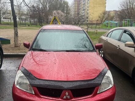 Мицубиси Лансер 2008 в Днепре (Днепропетровске) на Automoto.ua Красный Мицубиси Лансер, объемом двигателя 1.6 л и пробегом 138 тыс. км за 6000 $, фото 1 на Automoto.ua