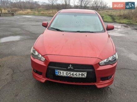 Мицубиси Лансер 2008 в Козельщине на Automoto.ua Красный Мицубиси Лансер, объемом двигателя 2 л и пробегом 130 тыс. км за 7400 $, фото 1 на Automoto.ua