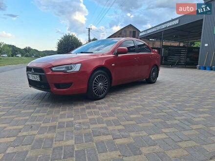 Красный Мицубиси Лансер, объемом двигателя 1.5 л и пробегом 227 тыс. км за 6700 $, фото 1 на Automoto.ua