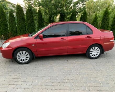 Червоний Міцубісі Lancer, об'ємом двигуна 1.6 л та пробігом 153 тис. км за 4950 $, фото 1 на Automoto.ua