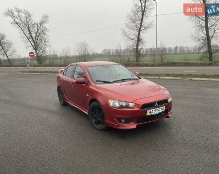 Червоний Міцубісі Lancer, об'ємом двигуна 2 л та пробігом 223 тис. км за 5999 $, фото 1 на Automoto.ua