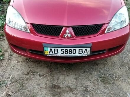 Червоний Міцубісі Lancer, об'ємом двигуна 1.6 л та пробігом 141 тис. км за 4000 $, фото 1 на Automoto.ua