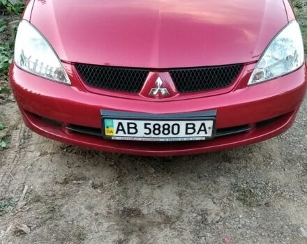 Червоний Міцубісі Lancer, об'ємом двигуна 1.6 л та пробігом 141 тис. км за 4000 $, фото 1 на Automoto.ua