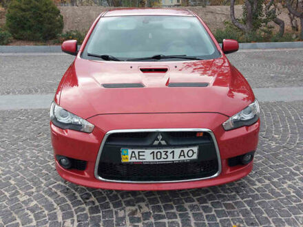 Червоний Міцубісі Lancer, об'ємом двигуна 2 л та пробігом 58 тис. км за 12900 $, фото 1 на Automoto.ua
