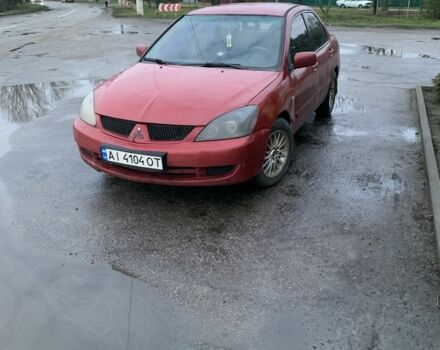 Червоний Міцубісі Lancer, об'ємом двигуна 1.6 л та пробігом 230 тис. км за 3000 $, фото 1 на Automoto.ua