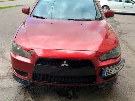 Червоний Міцубісі Lancer, об'ємом двигуна 2 л та пробігом 168 тис. км за 6800 $, фото 1 на Automoto.ua