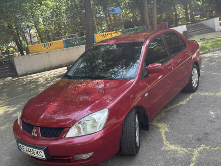 Мицубиси Лансер 2008 в Каменское - Днепродзержинск на Automoto.ua Красный Мицубиси Лансер, объемом двигателя 1.6 л и пробегом 270 тыс. км за 5699 $, фото 1 на Automoto.ua