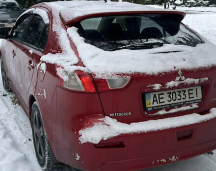 Красный Мицубиси Лансер, объемом двигателя 1.8 л и пробегом 357 тыс. км за 5500 $, фото 1 на Automoto.ua