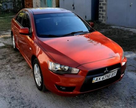 Червоний Міцубісі Lancer, об'ємом двигуна 2 л та пробігом 110 тис. км за 7500 $, фото 1 на Automoto.ua