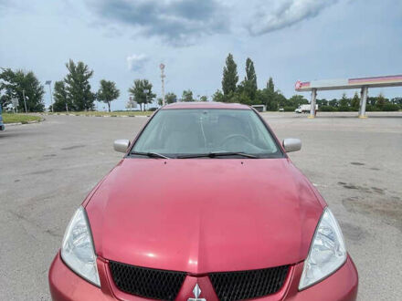 Міцубісі Lancer 2008 у Черкасах на Automoto.ua Червоний Міцубісі Lancer, об'ємом двигуна 1.6 л та пробігом 280 тис. км за 3500 $, фото 1 на Automoto.ua