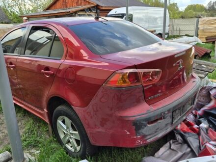 Червоний Міцубісі Lancer, об'ємом двигуна 2 л та пробігом 240 тис. км за 3500 $, фото 1 на Automoto.ua