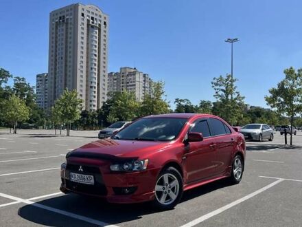 Мицубиси Лансер 2008 в Киеве на Automoto.ua Красный Мицубиси Лансер, объемом двигателя 2 л и пробегом 128 тыс. км за 8500 $, фото 1 на Automoto.ua