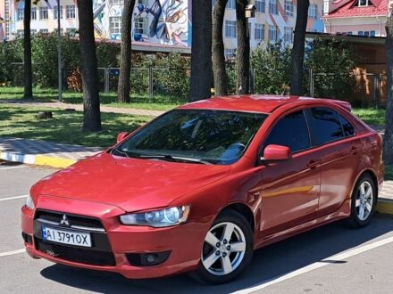 Червоний Міцубісі Lancer, об'ємом двигуна 1.8 л та пробігом 327 тис. км за 5700 $, фото 1 на Automoto.ua