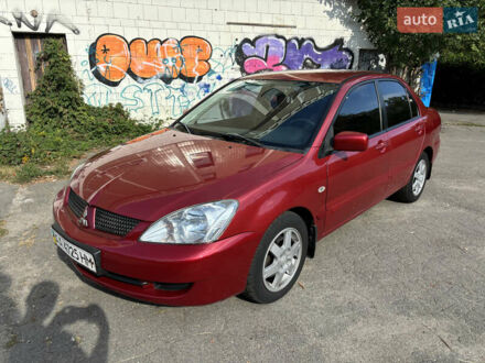 Червоний Міцубісі Lancer, об'ємом двигуна 1.6 л та пробігом 264 тис. км за 4700 $, фото 1 на Automoto.ua