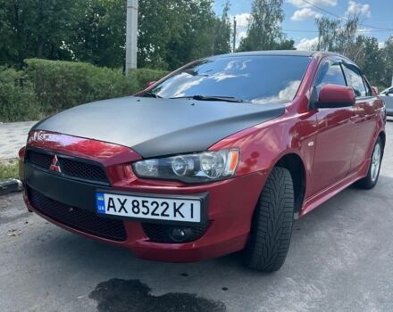 Червоний Міцубісі Lancer, об'ємом двигуна 2 л та пробігом 120 тис. км за 7000 $, фото 1 на Automoto.ua