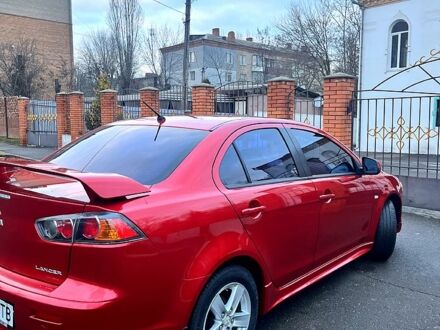 Міцубісі Lancer 2008 у Кривому Розі на Automoto.ua Червоний Міцубісі Lancer, об'ємом двигуна 2 л та пробігом 220 тис. км за 8000 $, фото 1 на Automoto.ua