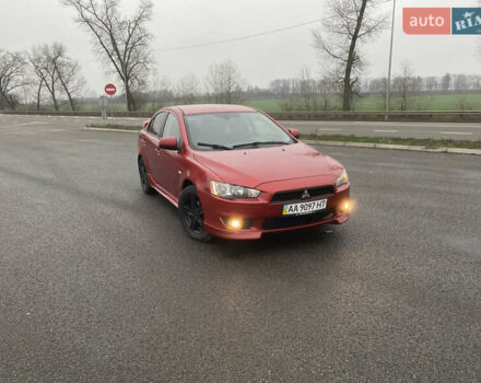 Червоний Міцубісі Lancer, об'ємом двигуна 2 л та пробігом 223 тис. км за 5899 $, фото 1 на Automoto.ua